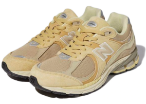 Giay New Balance x Auralee 2002R 'Yellow Beige' M2002RE1