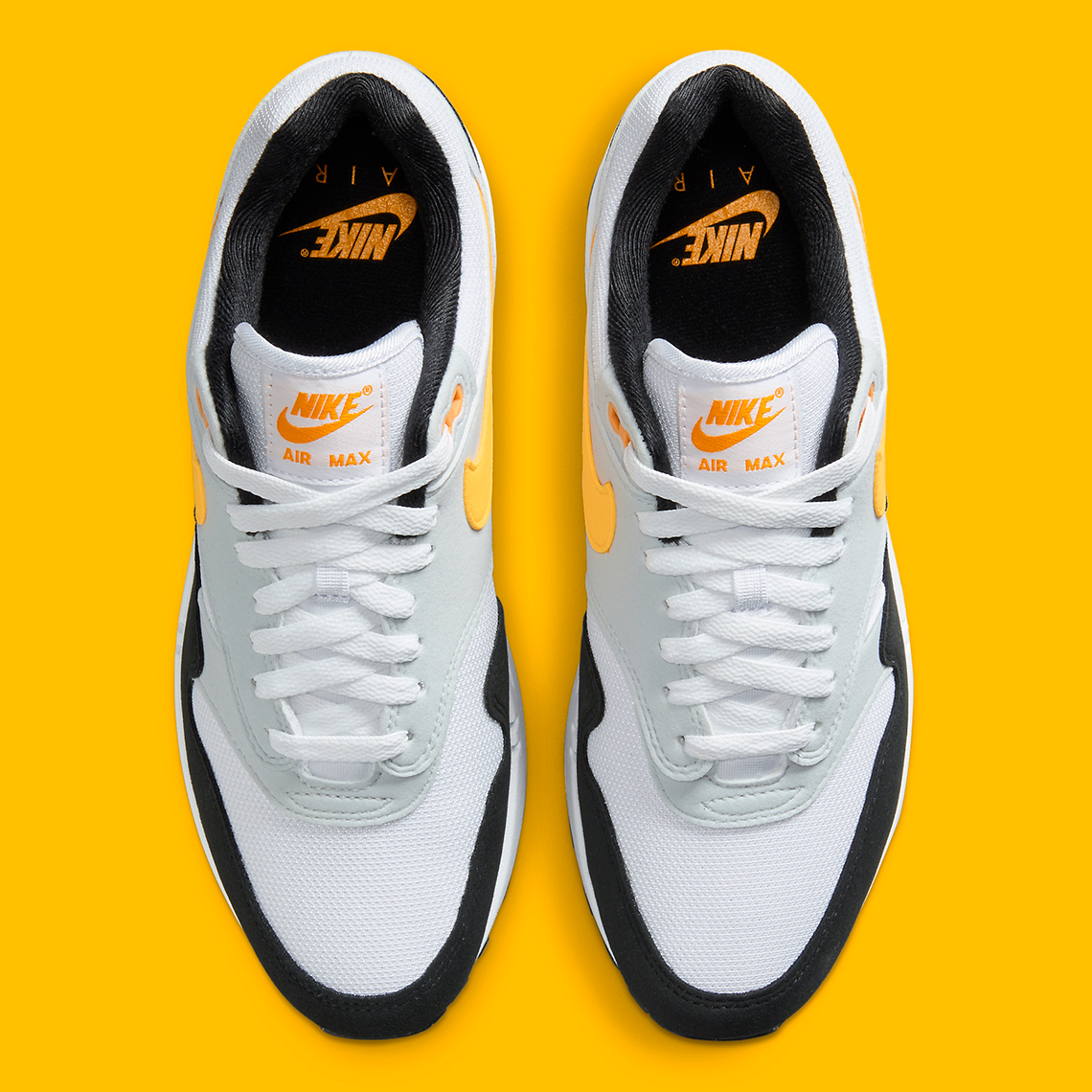 Giay Nike Air Max 1 'White University Gold' FD9082-104