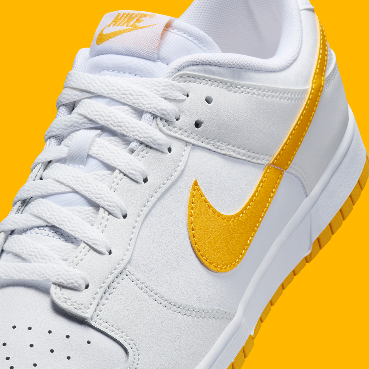 Giay Nike Dunk Low 'White University Gold' DV0831-110