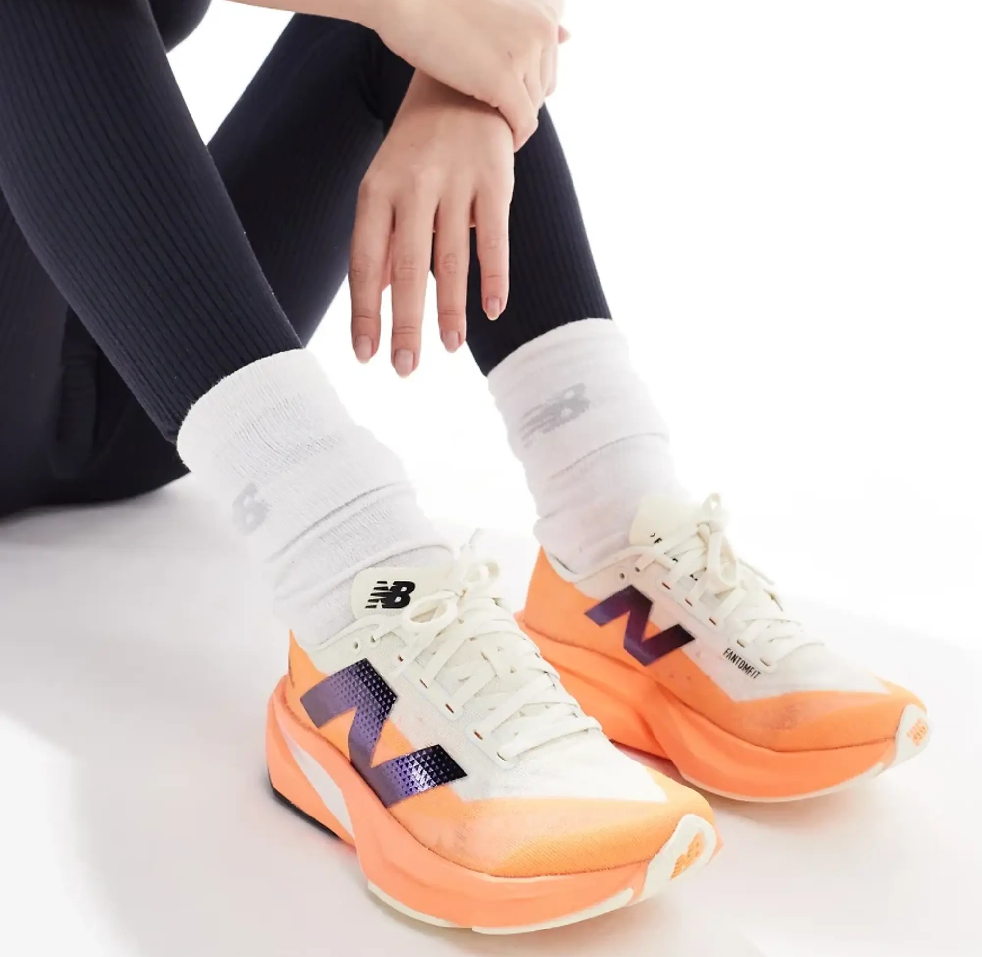 Giay New Balance FuelCell Rebel v4 'Hot Mango' WFCXCC4