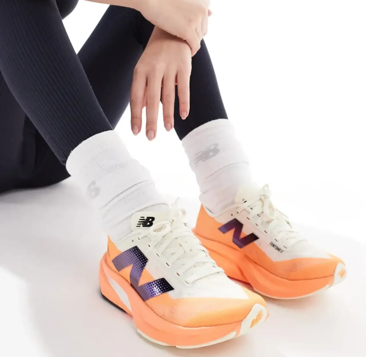 Giay New Balance FuelCell Rebel v4 'Hot Mango' WFCXCC4