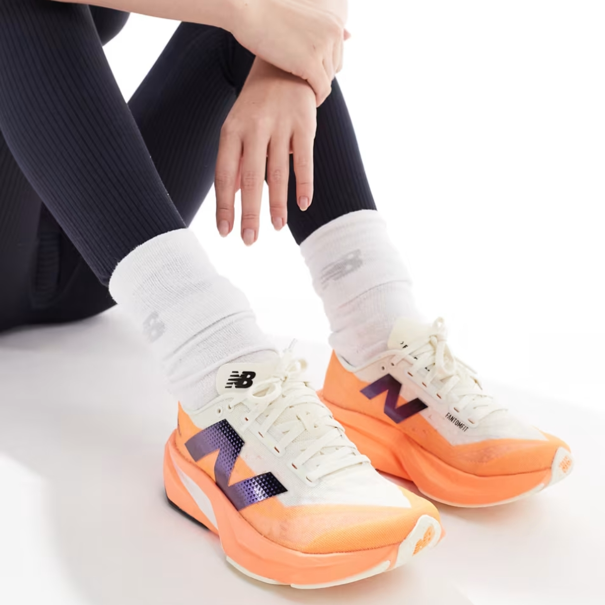 Giay New Balance Fuelcell Rebel v4 'Hot Mango' MFCXCO4