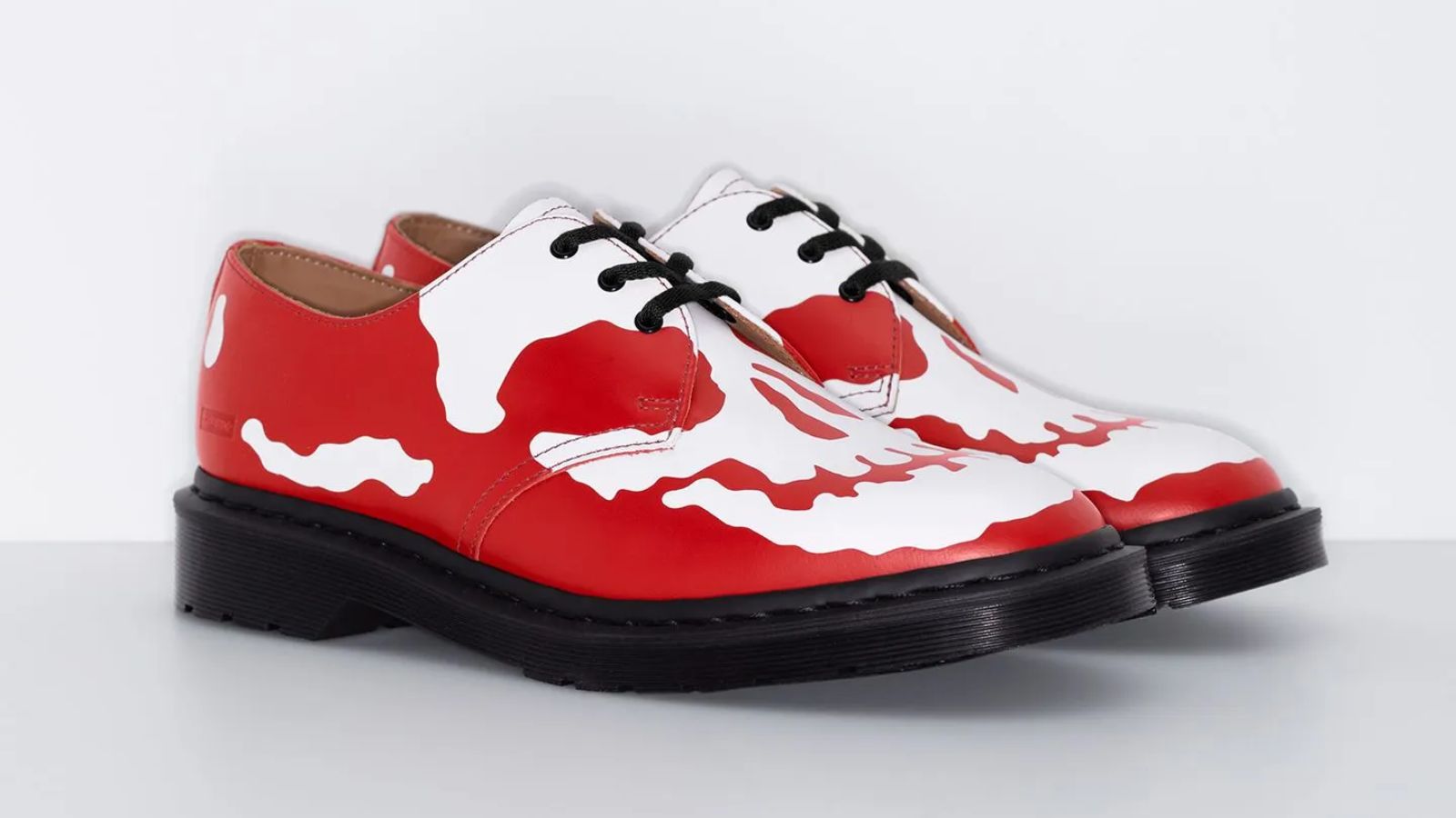 Hinh anh 4: Phien ban Supreme x Dr. Martens 1461 3-Eye voi thiet ke dau lau