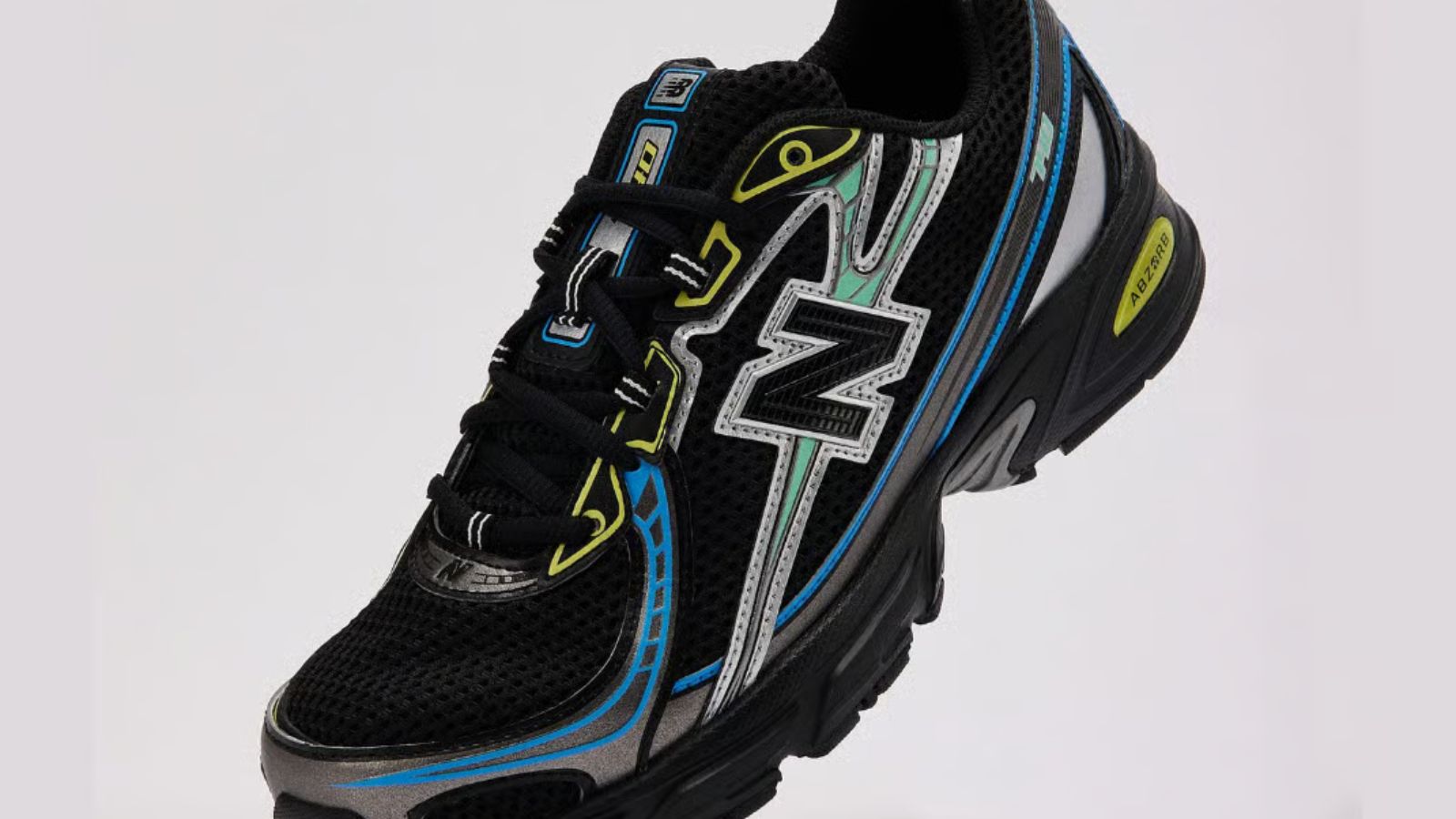 Hinh anh 2: New Balance 740 “Night Moves” voi phoi mau den va diem nhan nang dong