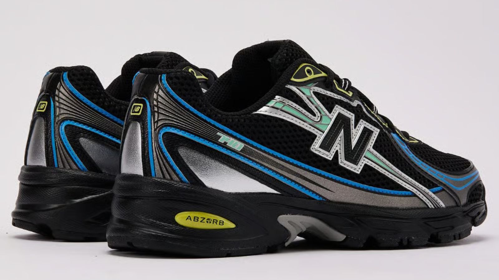 Hinh anh 3: New Balance 740 “Night Moves” voi phoi mau den va diem nhan nang dong